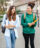 Two young women walking to campus