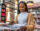 Young woman shopping for records